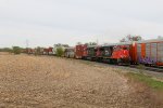 CN 5703 & 2510 work hard to keep Z149 moving at track speed